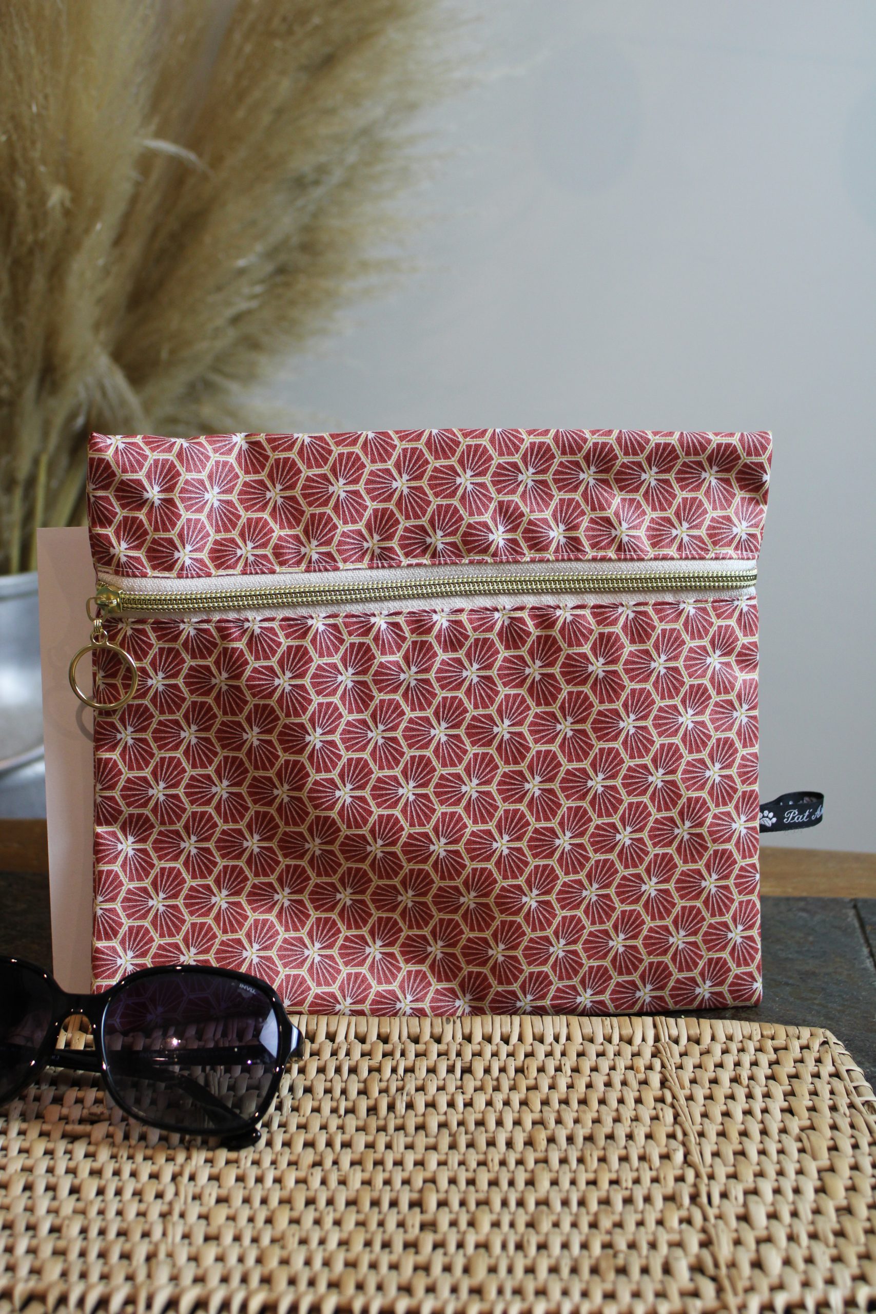Trousse imperméable grandes fleurs lie de vin