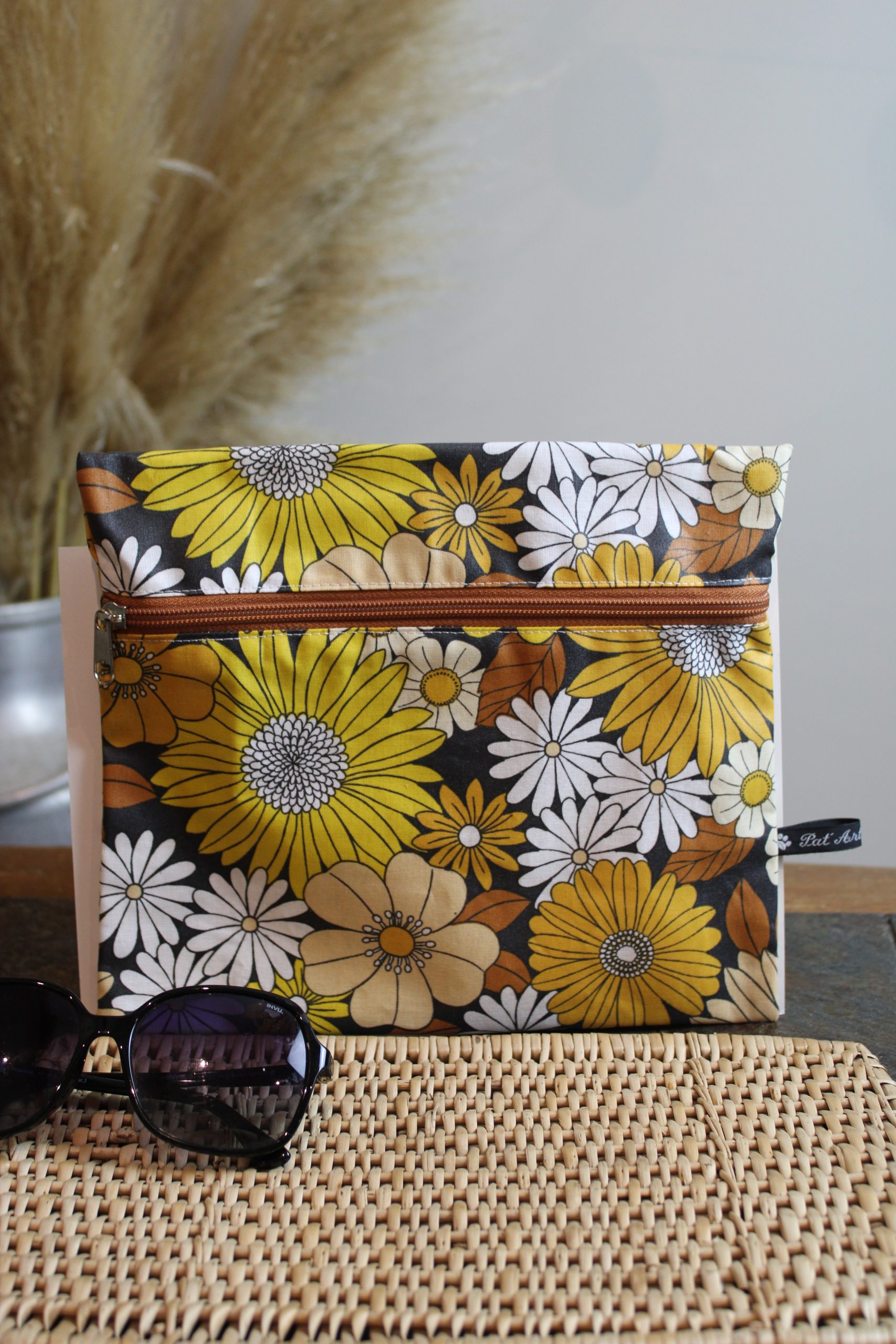 Trousse imperméable fleurs jaunes