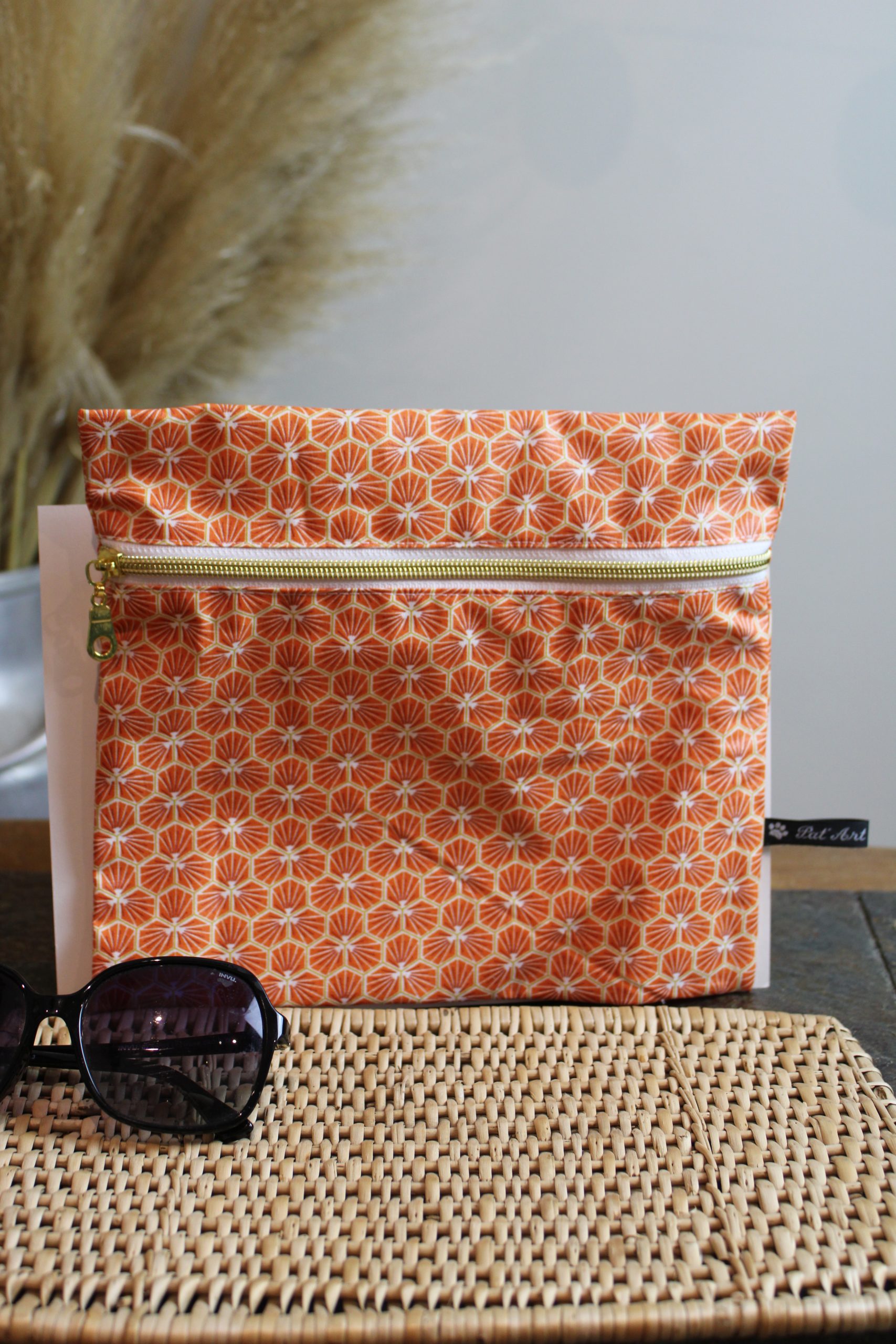 Trousse imperméable grandes fleurs oranges